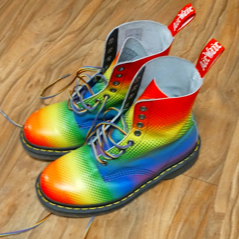 A pair of Dr martens rainbow pride boots size 6 W size 5 M.